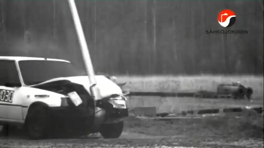 Frame from the archive crash test film: the KAPU-HE pole struck by a test car.